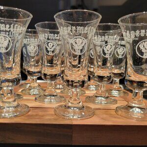 Vintage Jägermeister footed cordial shot glasses featuring the iconic stag logo